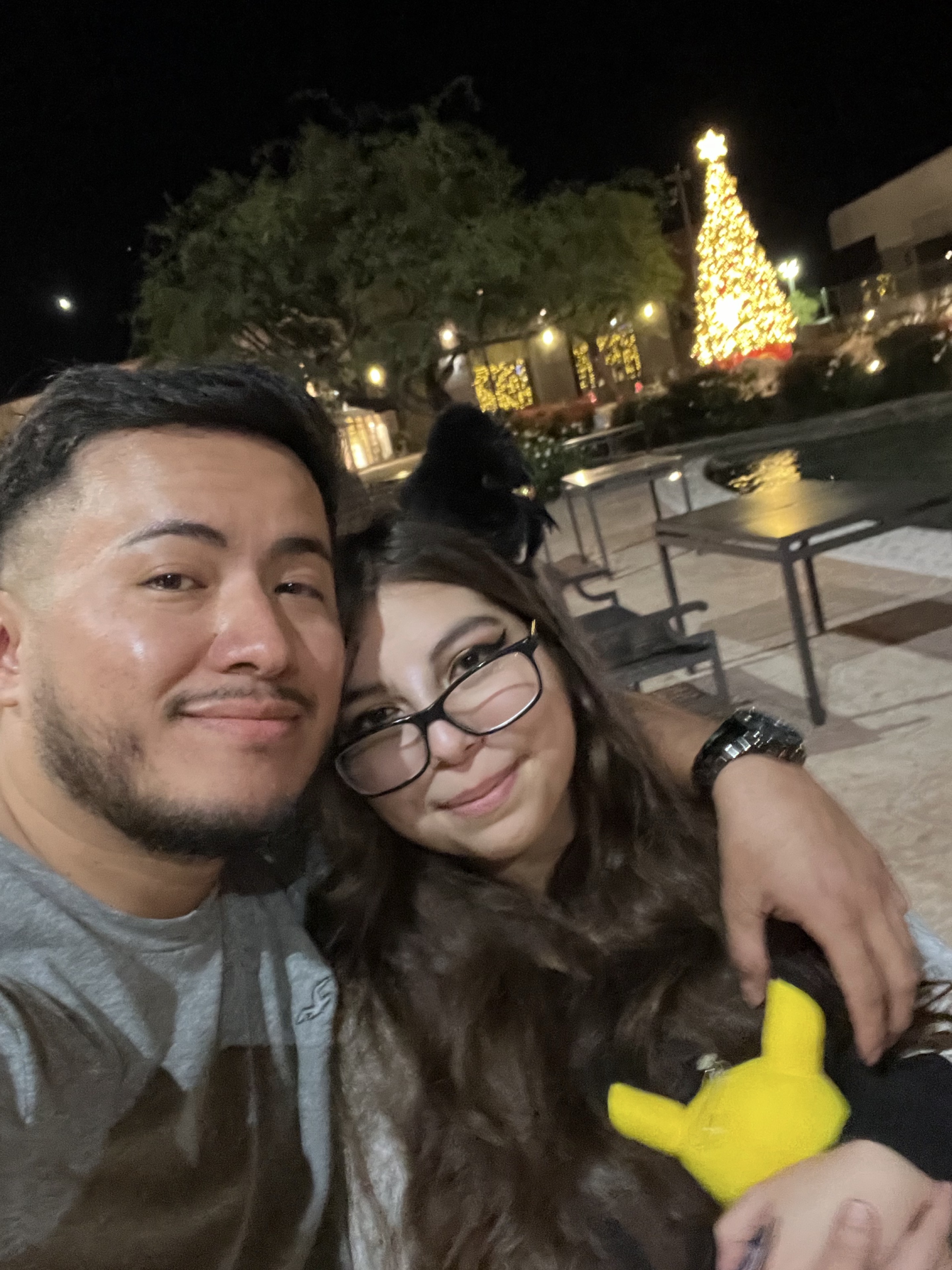 Javier and Shylynn together under the holiday lights